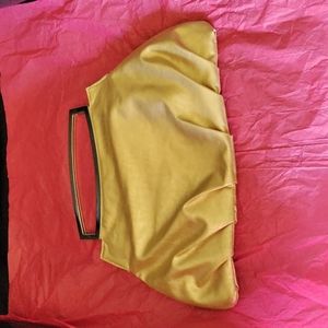 Gold Giannini evening clutch genuine faux leather bag.In good condition. Large.